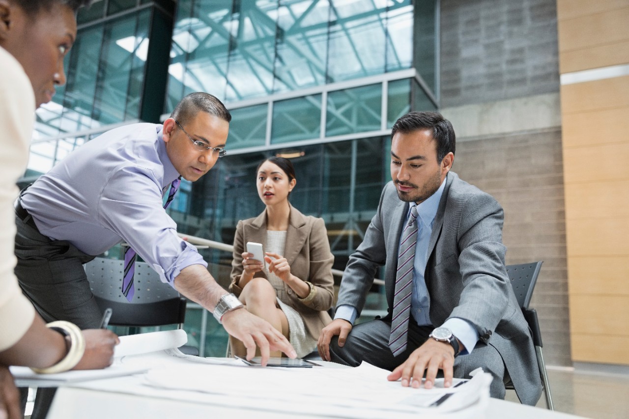 Businesspeople having meeting in office building