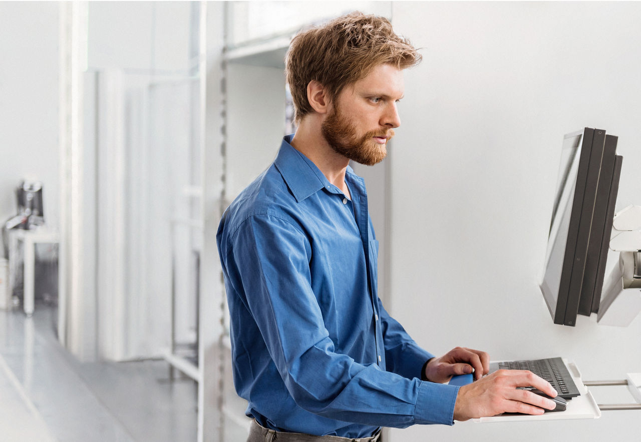 Businessman using computer in company