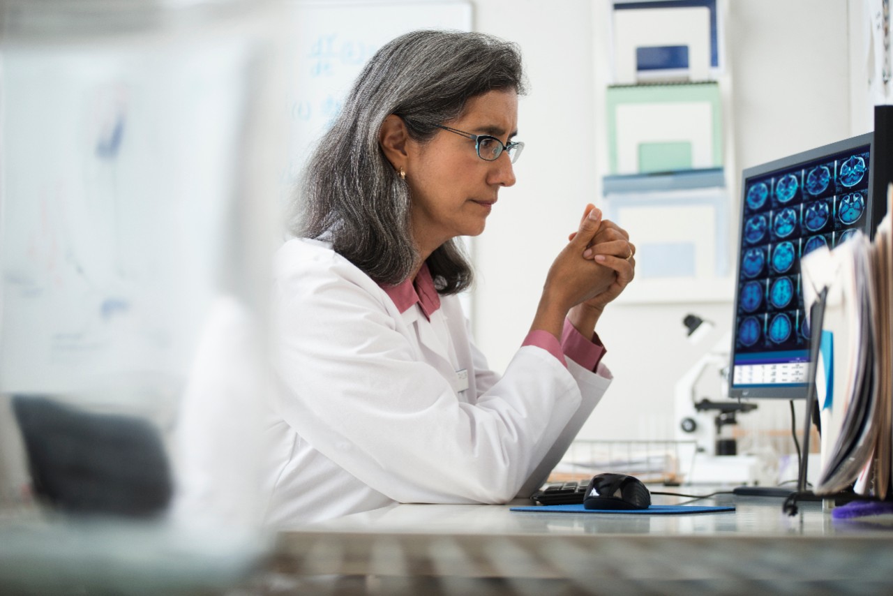 Doctor looking at imaging results on a computer