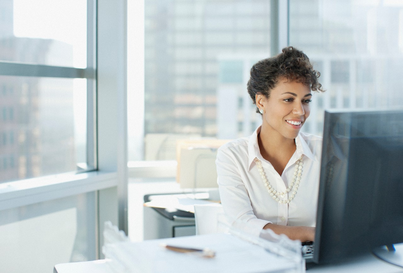 Businesswoman working at desk in office