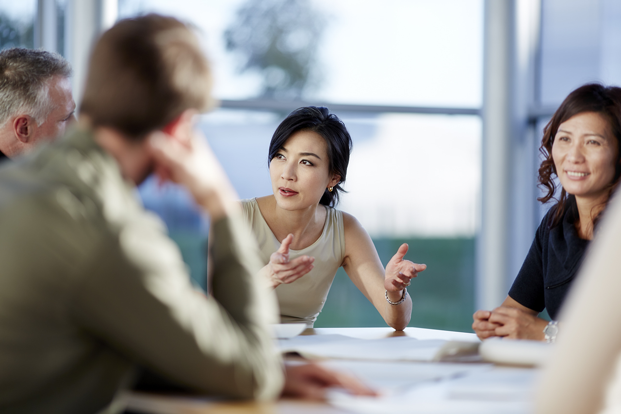 Business people talking in meeting